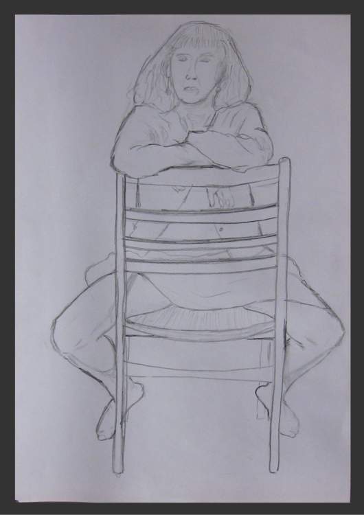 Carol Astride a Chair